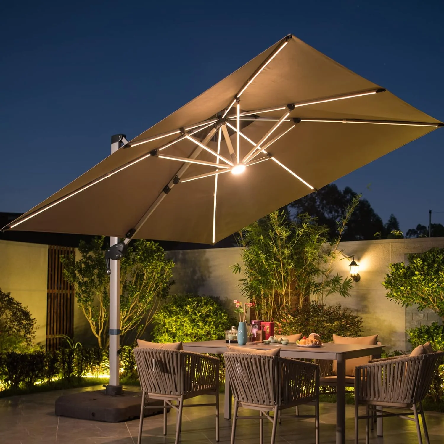 A 10-foot by 10-foot square cantilevered sunshade. equipped with a cross base and canopy. is included - a large heavy-duty outdoor sunshade. 360° rotating offset type. suitable for use in courtyards. backyard of swimming pools. terraces or gardens. i