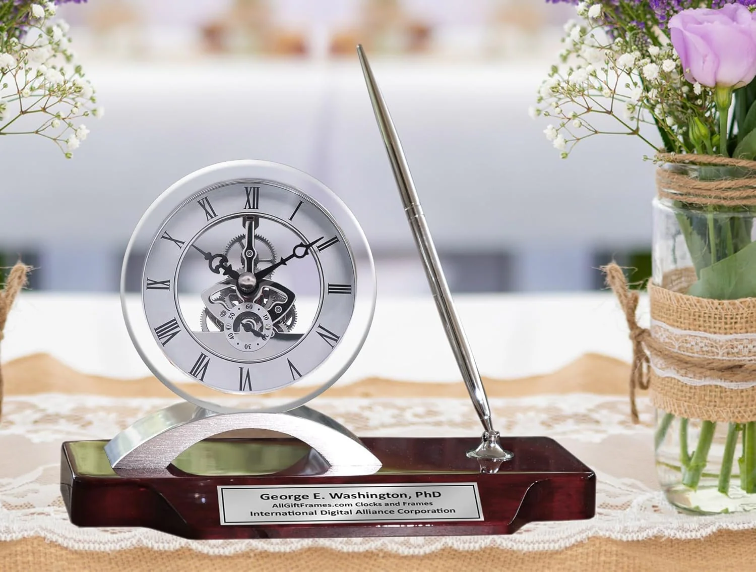 Desk clock. pen set. personalized. unique. silver clock. clear transparent case. gears. da Vinci. timepiece display. metal pen set. wooden desk stand. desk accessories. office. modern home. engraving